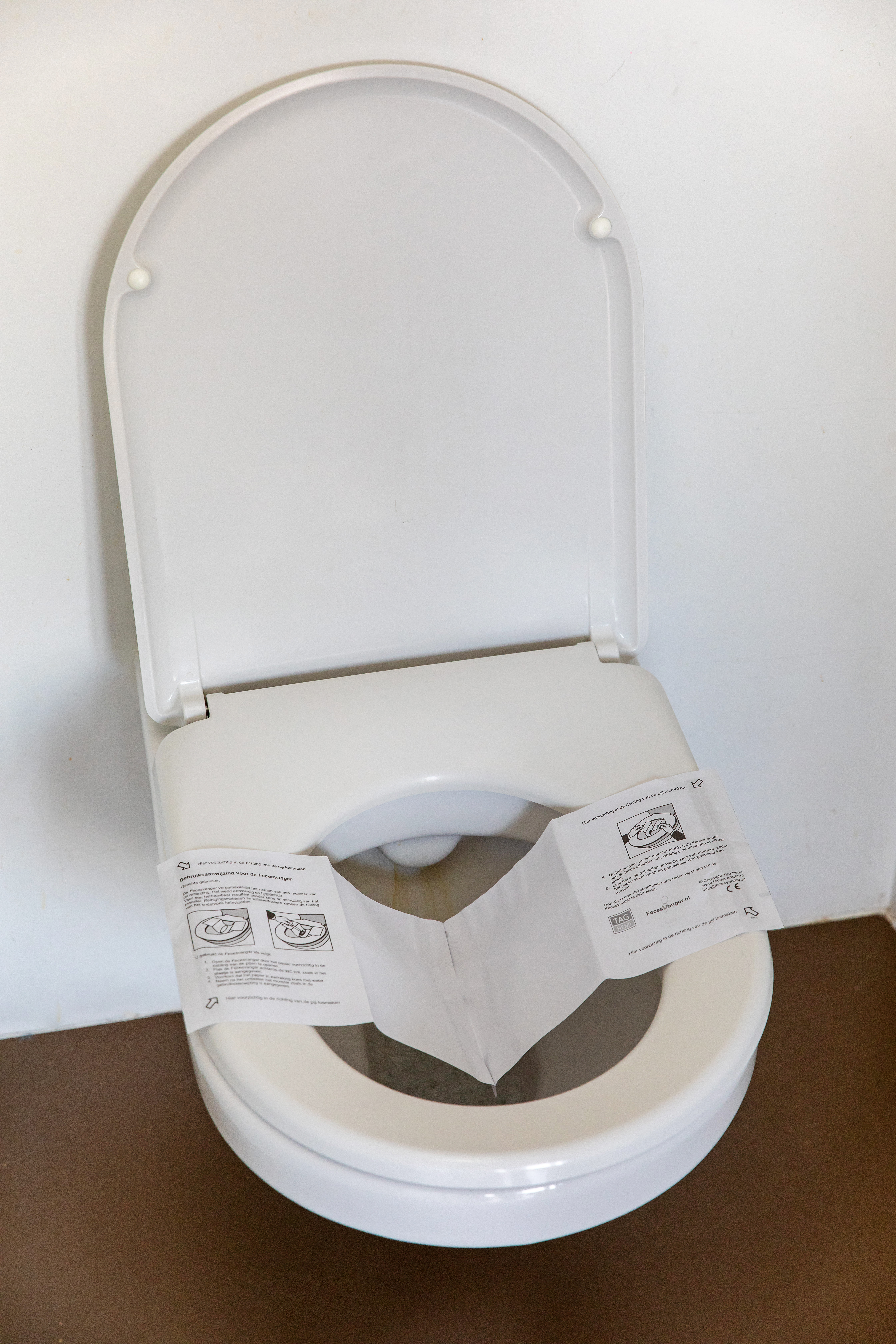 Afbeelding opvangpapier op het toilet