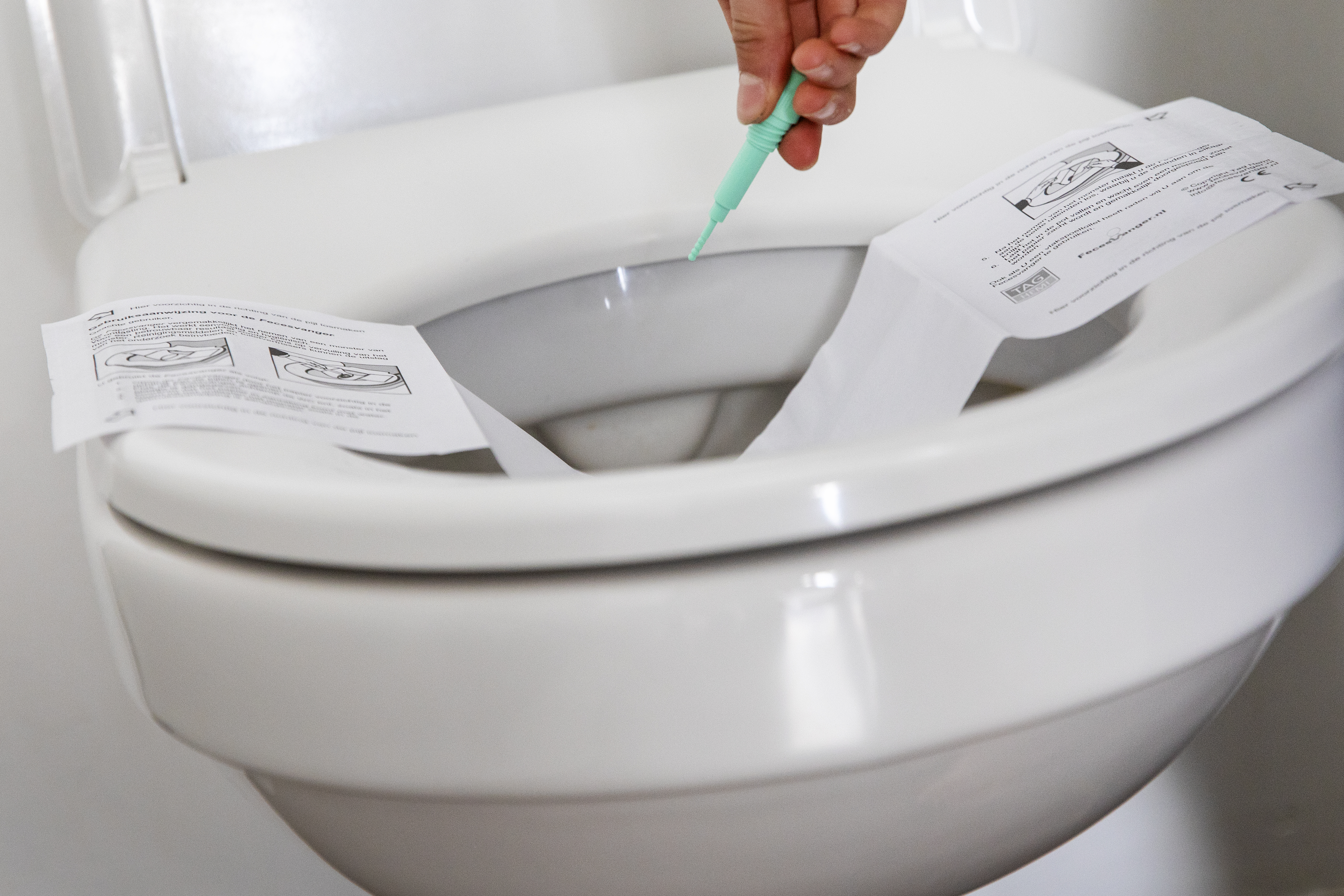 Afbeelding opvangpapier op het toilet